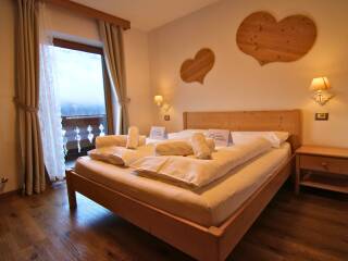 05. Catered chalet Neidia Selva Wolkenstein Tweepersoonskamer 1